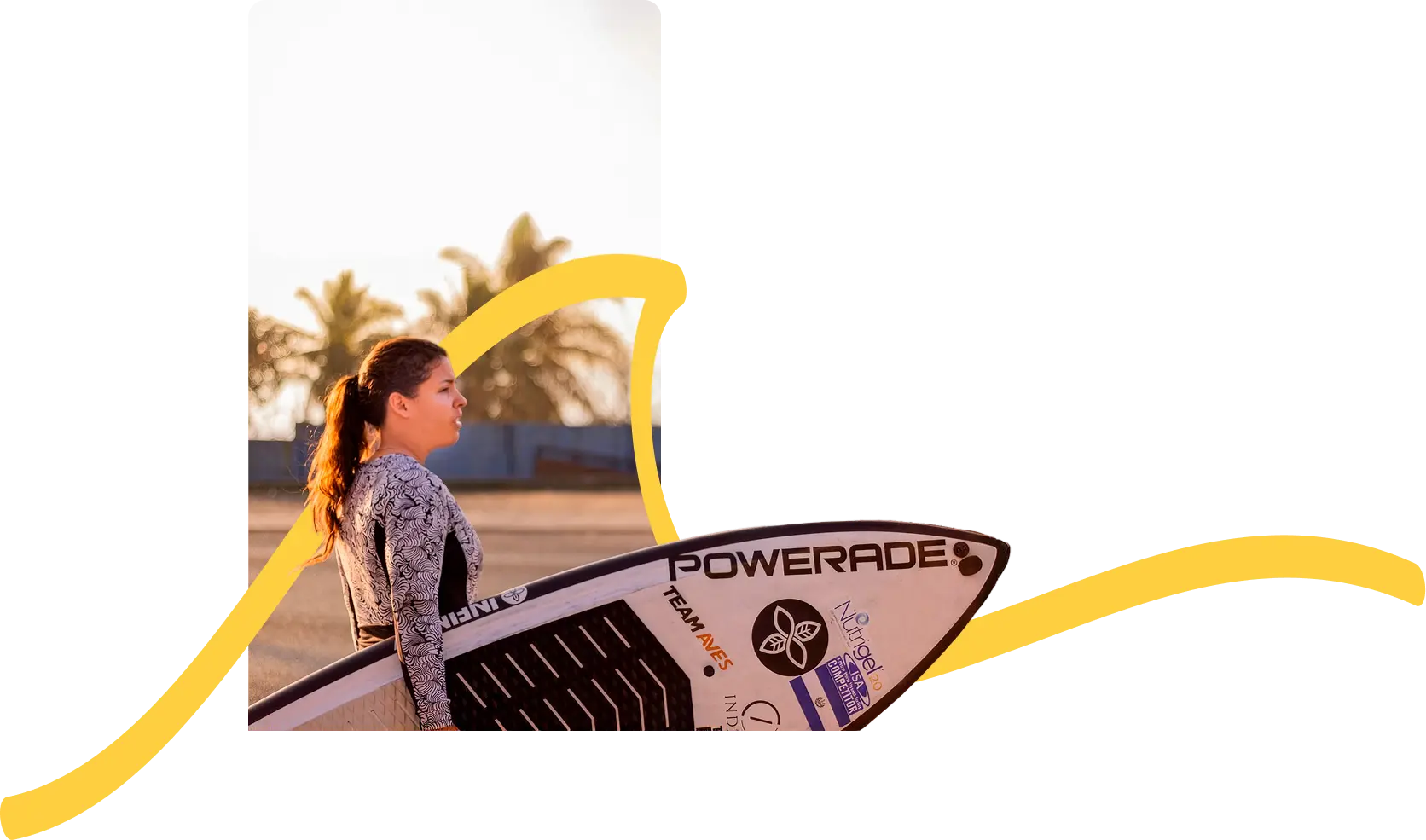 Josselyn Alabi, founder and head coach of Surfing ESA, holding her SUP surf board